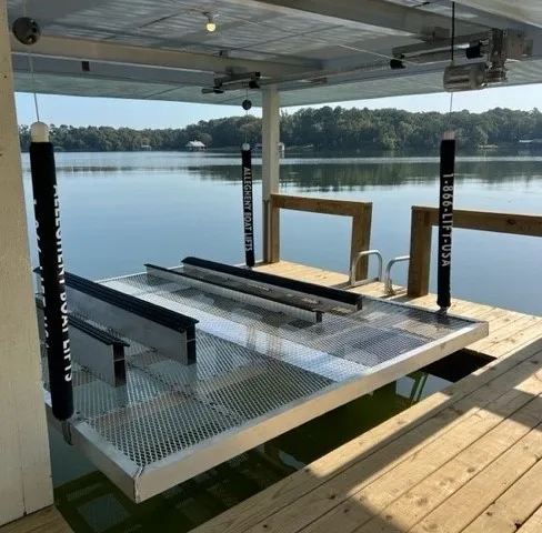 A dock with some metal rails on it